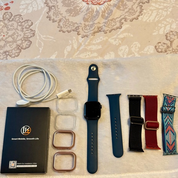 Apple Watch Series 7 41mm face with multiple accessories